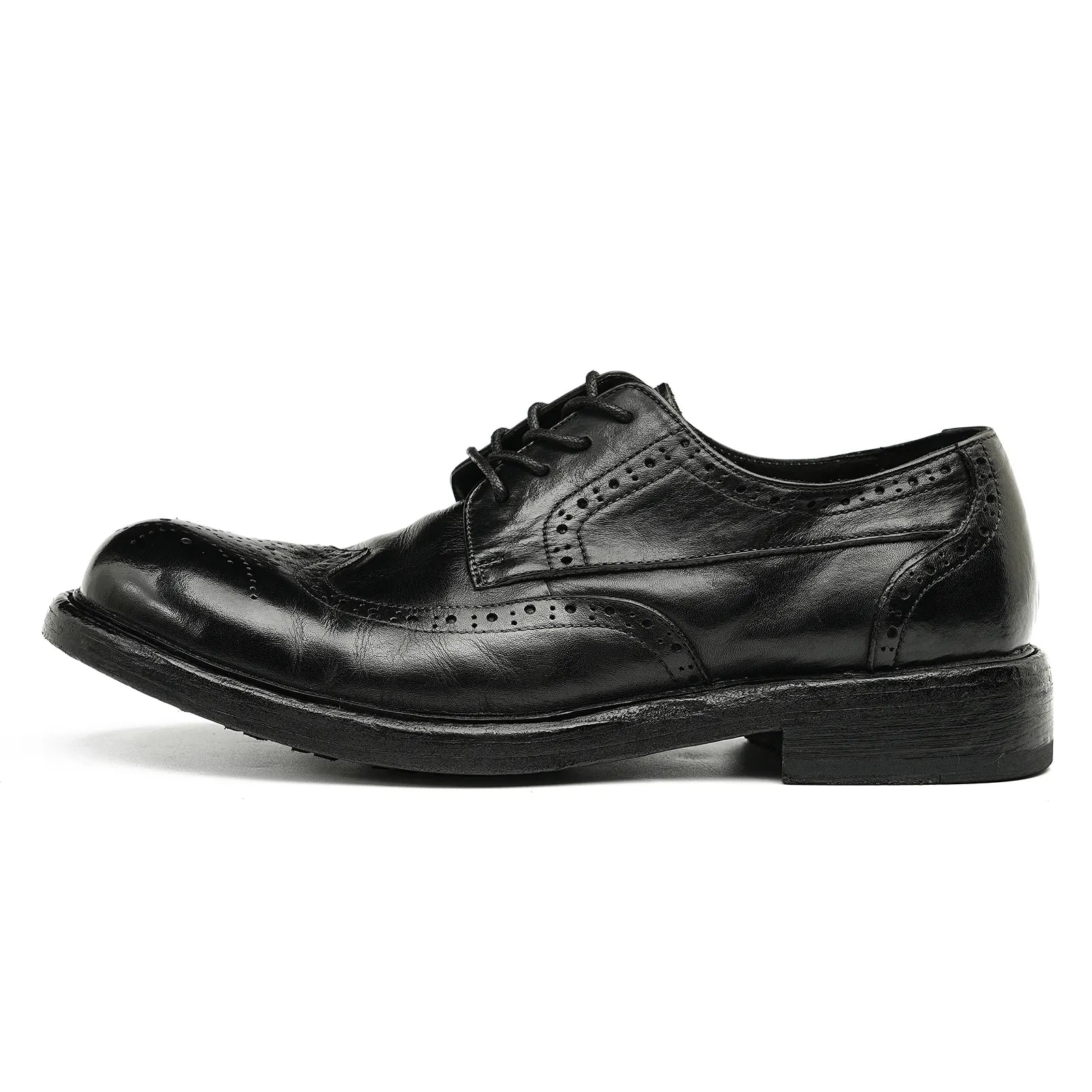Side Profile of Model 82803 Black Vintage Brogue Shoes with Intricate Decorative Perforations